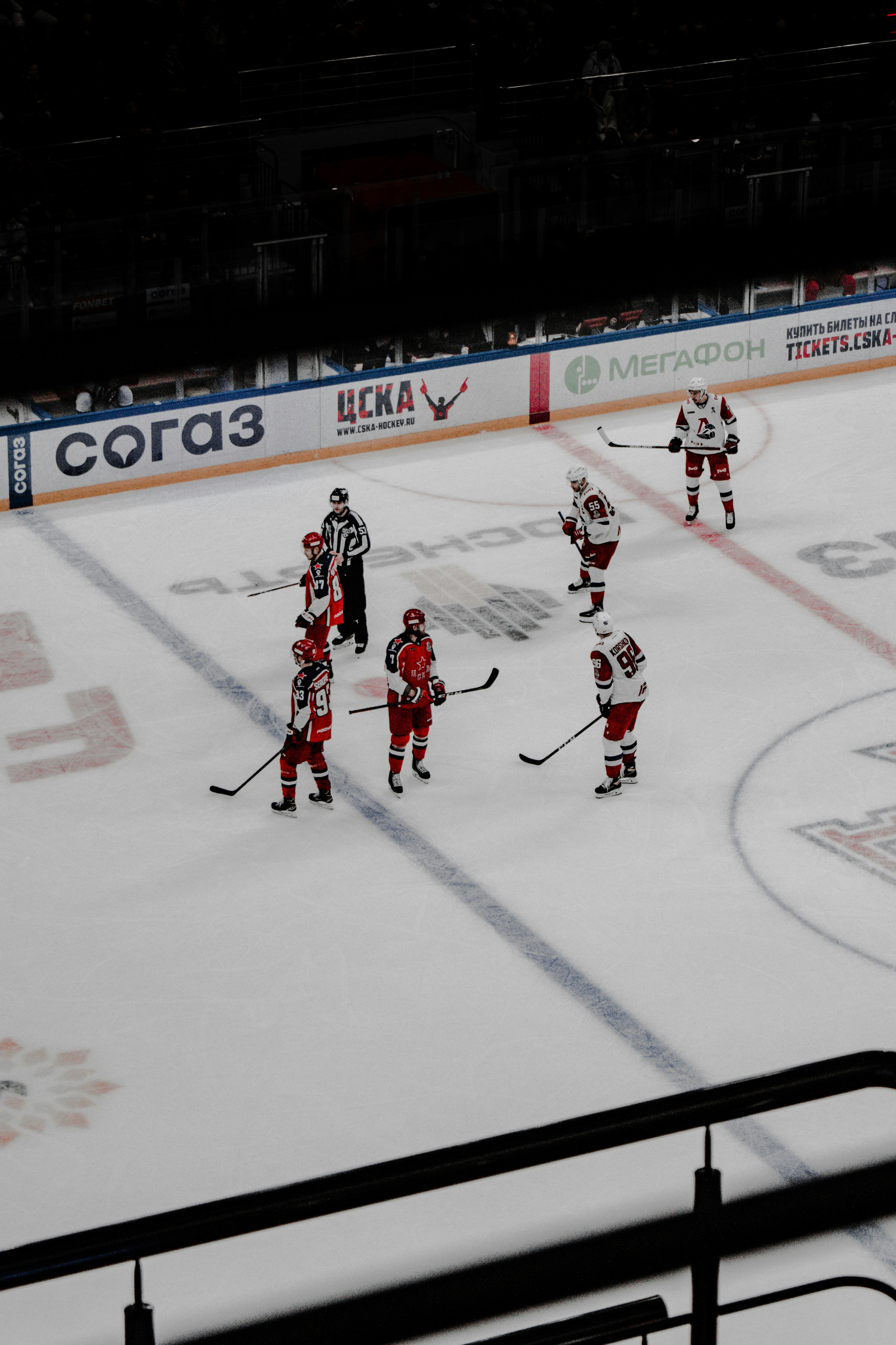 2 men playing ice hockey